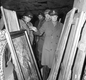 Allied Forces Supreme Commander Eisenhower, General Bradley, and Lt. General Patton inspect looted art (45,860 bytes)